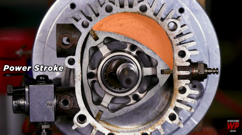 Illustration for article titled Watch A Wankel Rotary Engine’s Beautiful Explosions Through A Transparent Housing